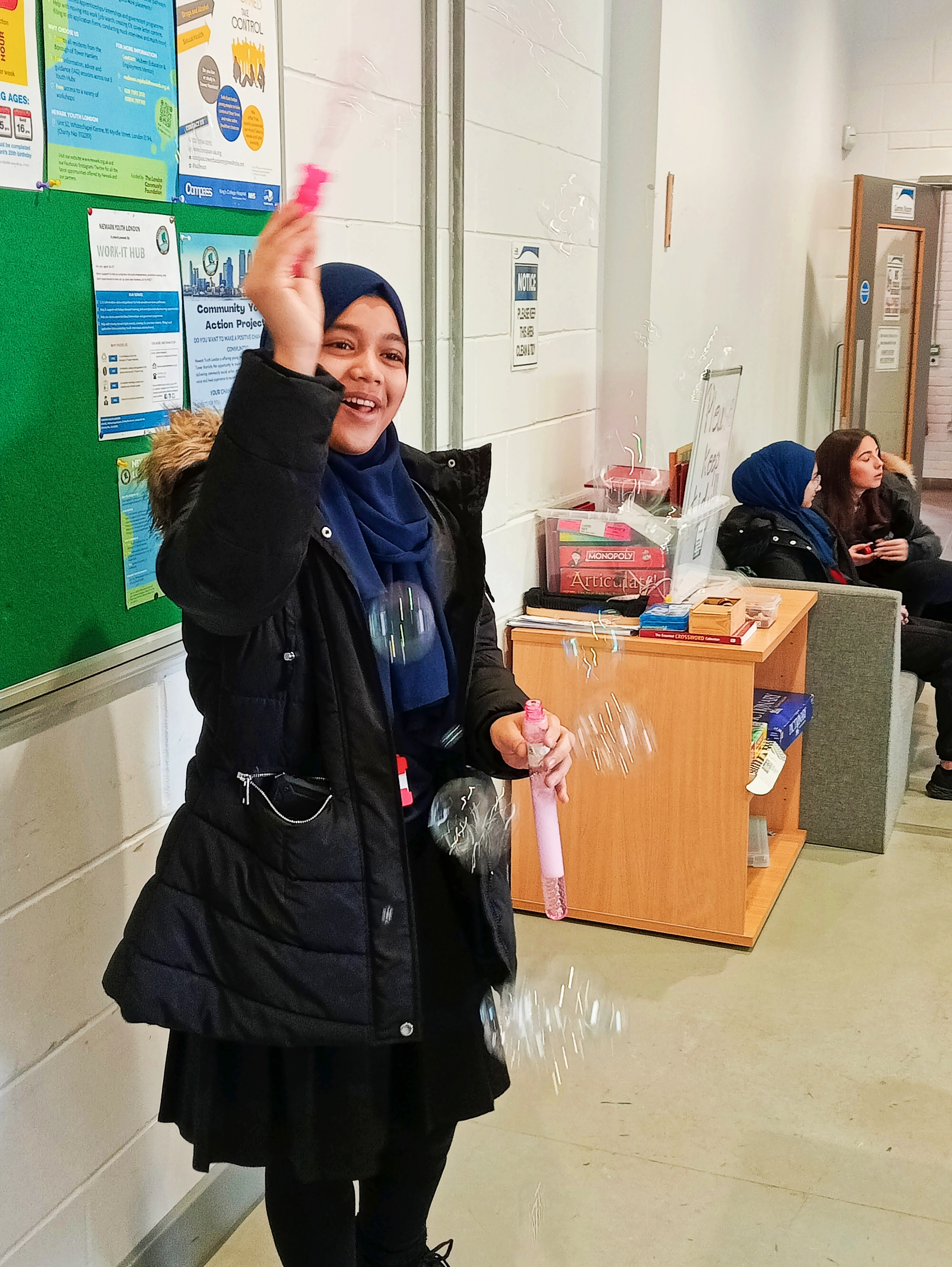 young person with bubbles