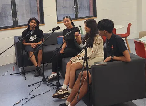 A group of Young People doing a Podcast