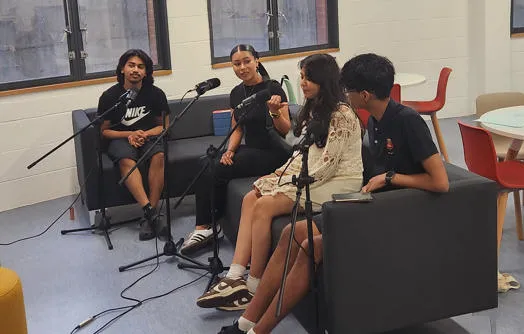 A group of Young People doing a Podcast