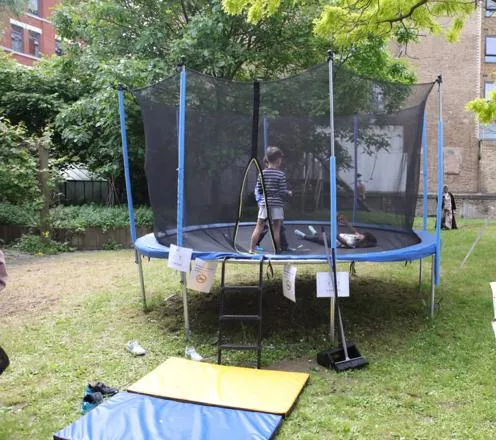 Young Person enjoying the outdoor trampoline