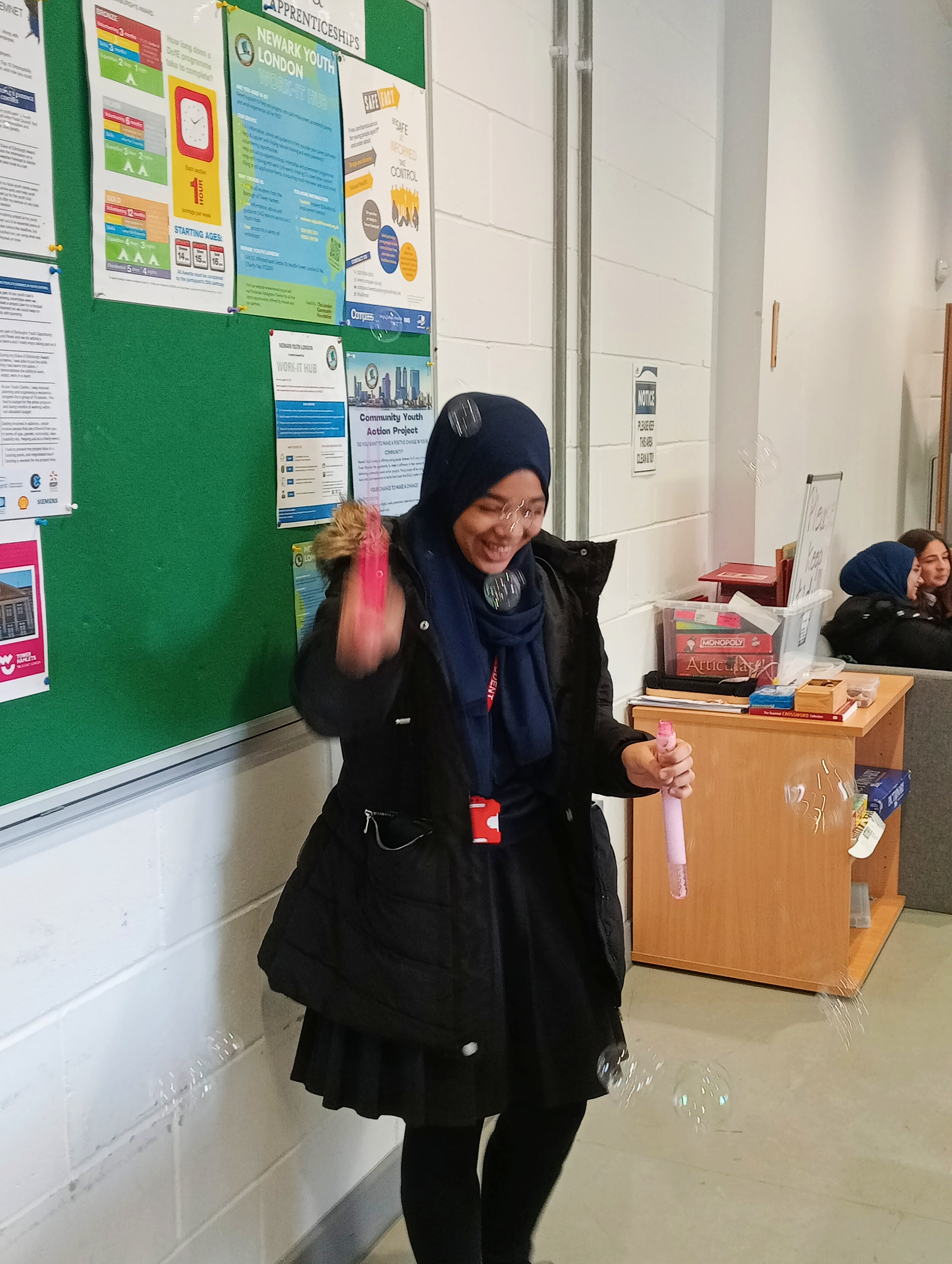 young person with bubbles