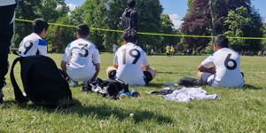 Young people in football shirts