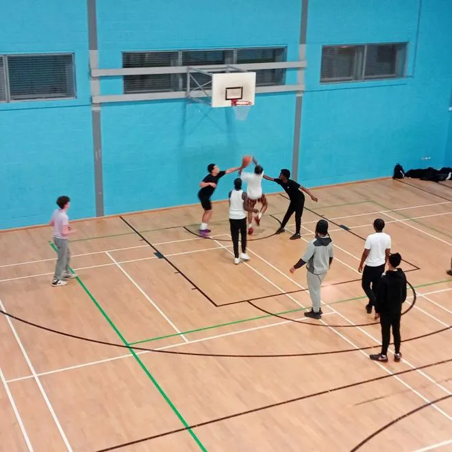 Young people playing basketball