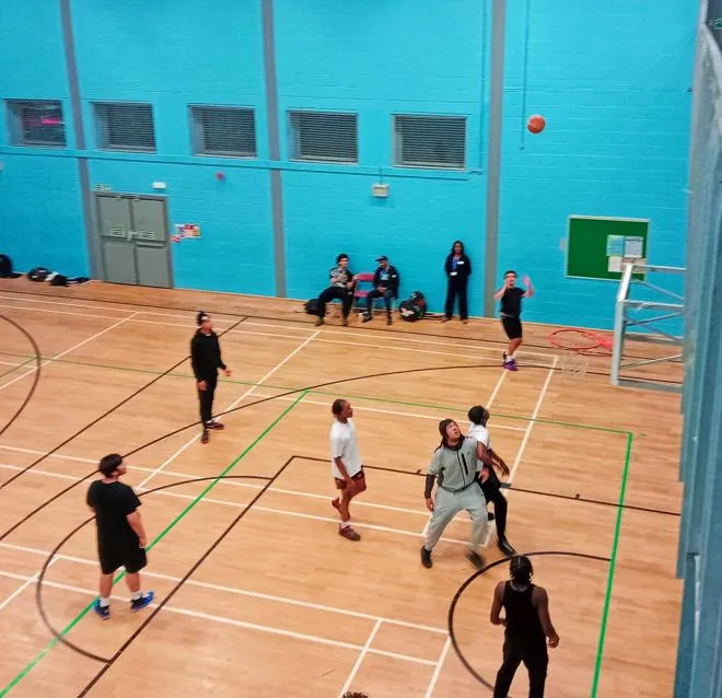 Young people playing basketball
