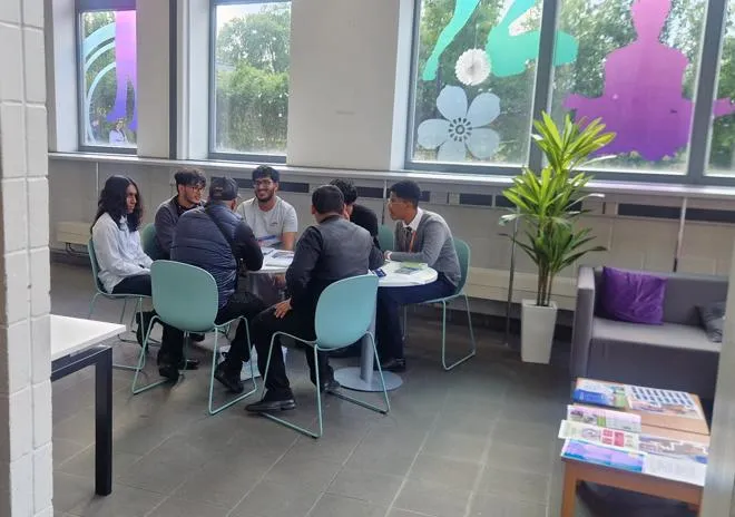 Youth worker listening to the voices of young people and engaging