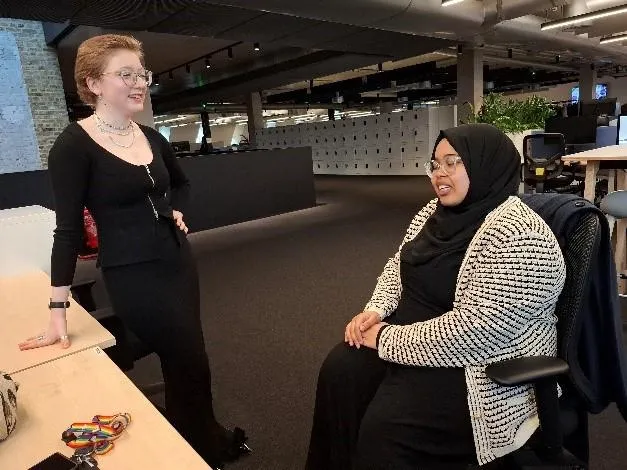 Apprentice Nasra at her desk