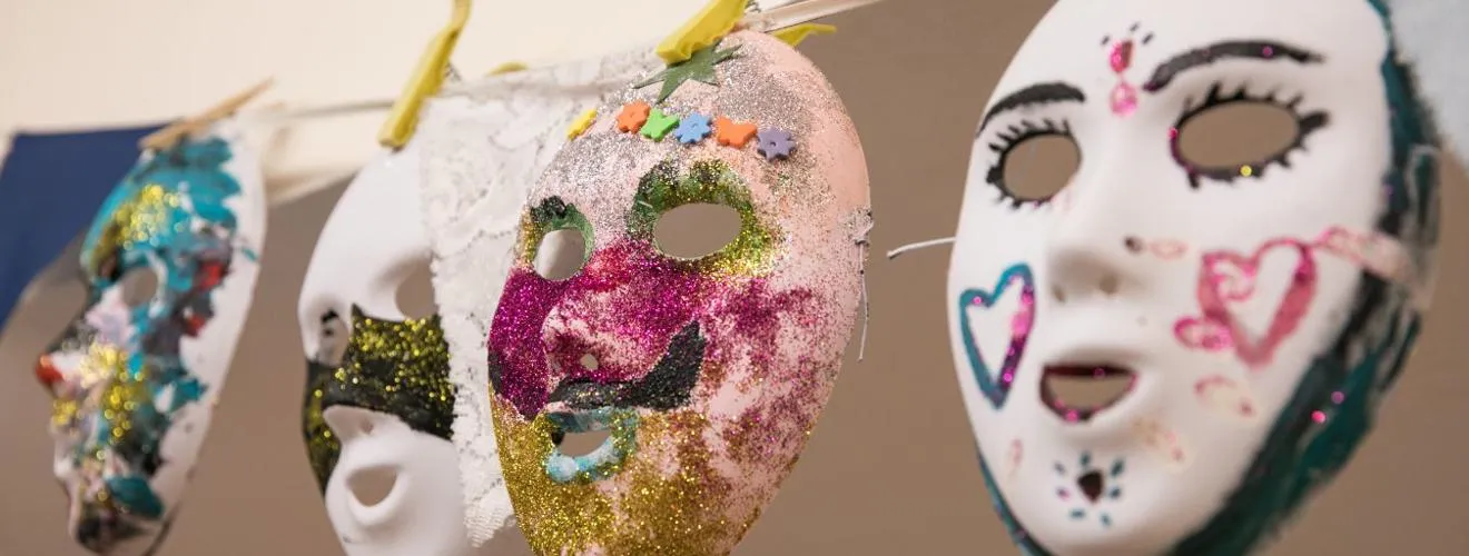 Masks at settlement artwork