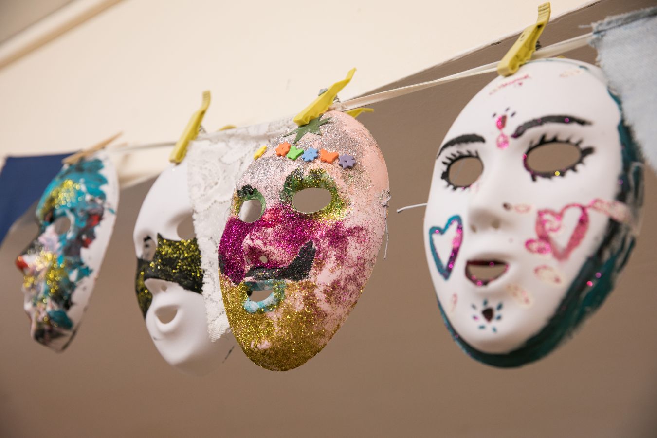 Masks at settlement artwork