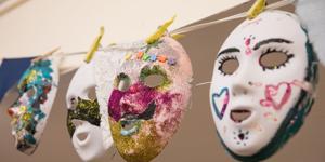Masks at settlement artwork