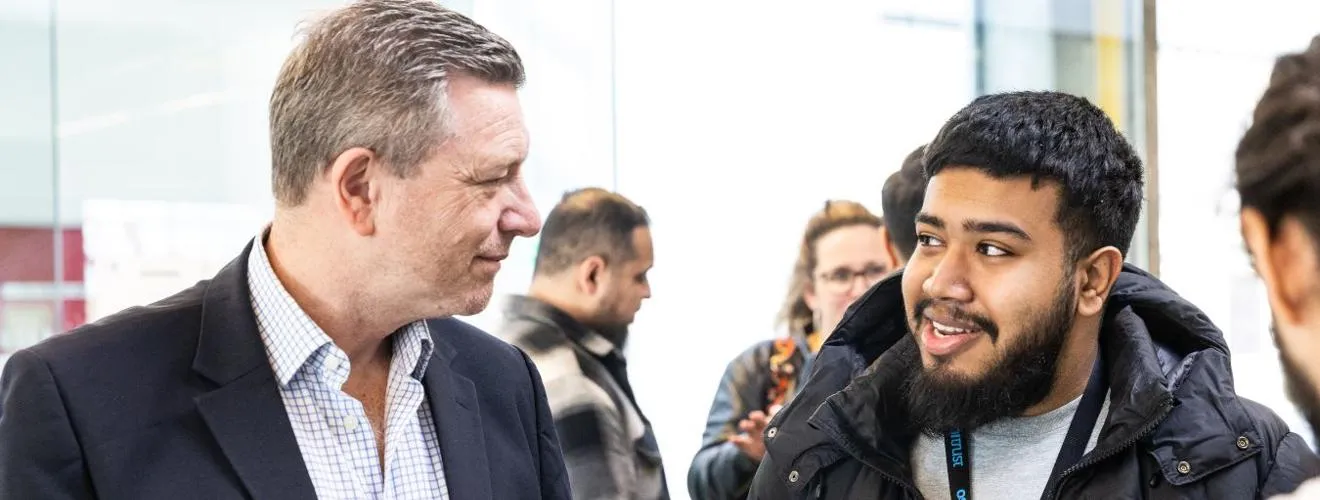 Two people discussing