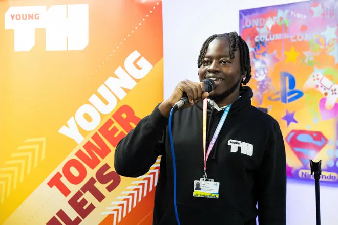 Young person speaking at event
