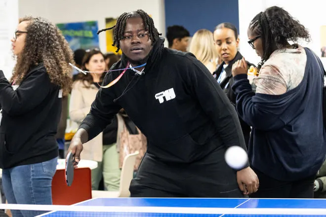 Youth Worker playing table tennis