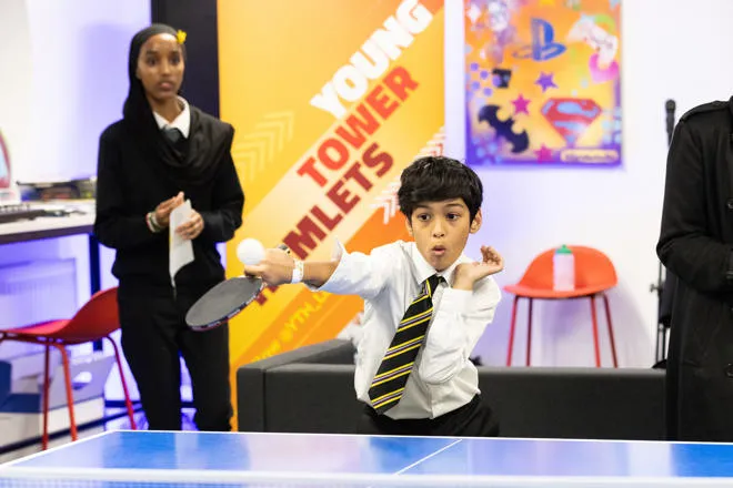 Young person balling table tennis