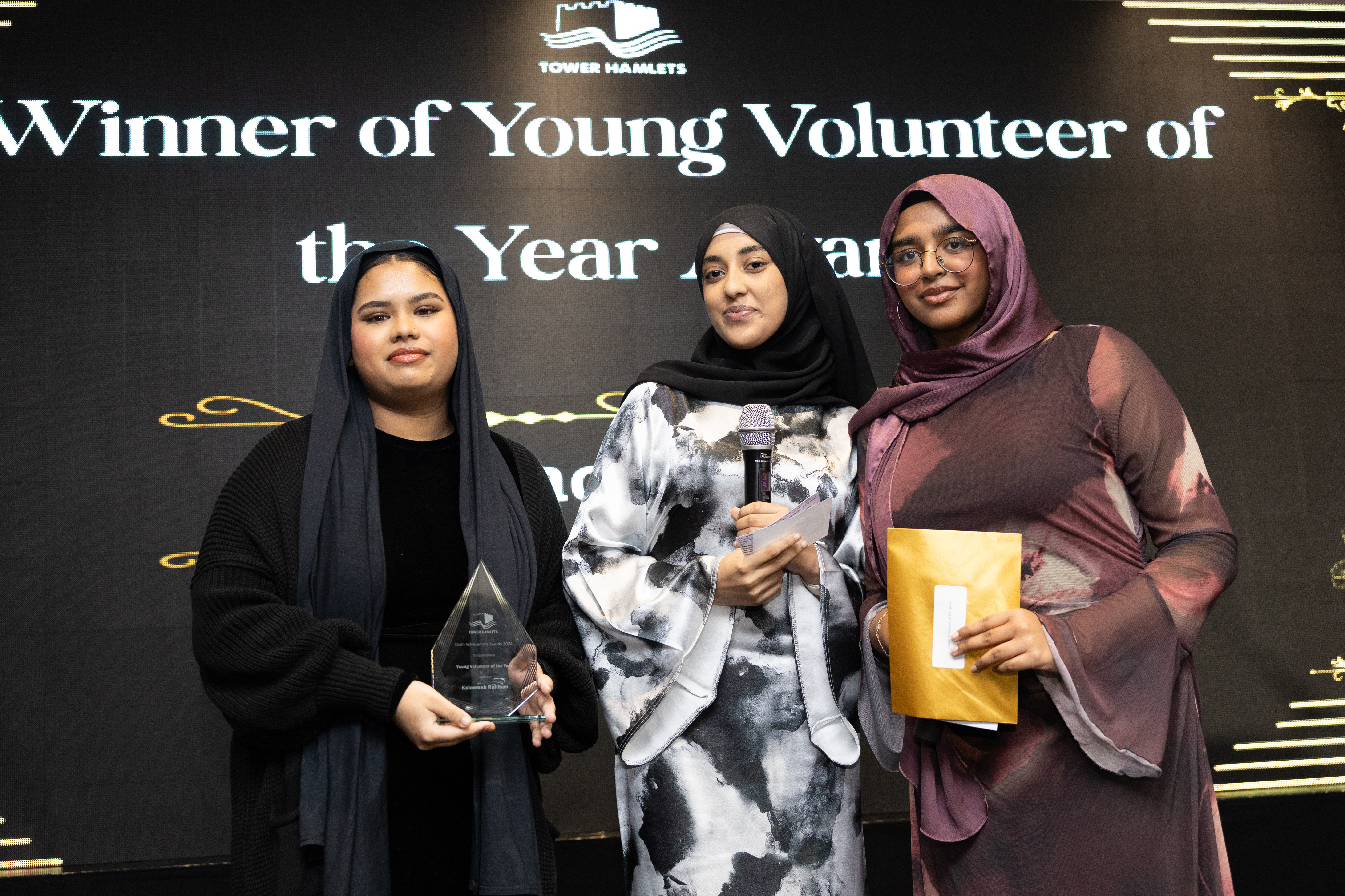 3 ladies receiving Young Volunteer of the Year awards
