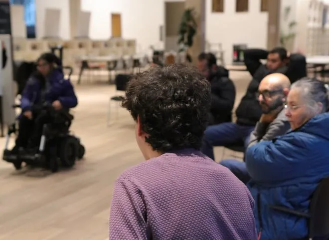 young people and adults having a disscusion