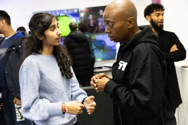Youth Worker speaking with a Young Person